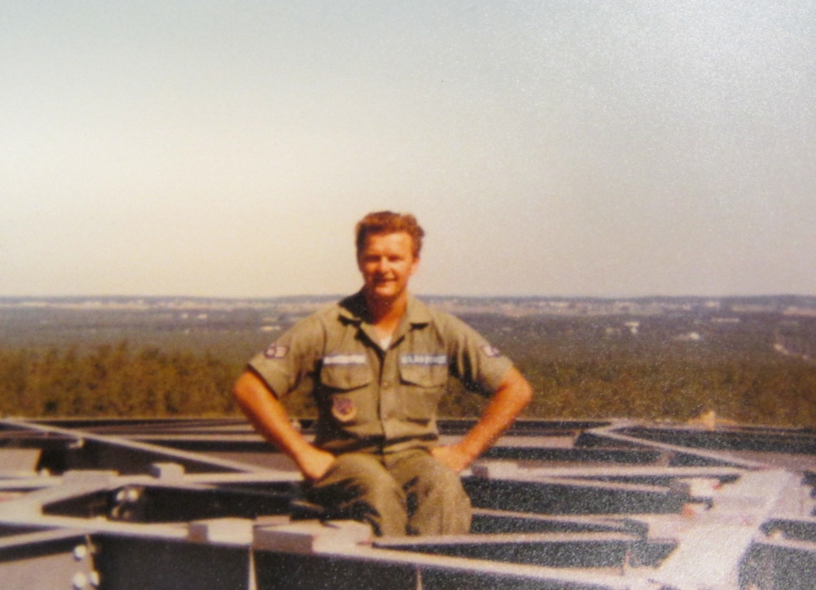 Rabczewski is perched atop a 50-foot microwave tower he was in the process of building while serving in the guard. Photo provided